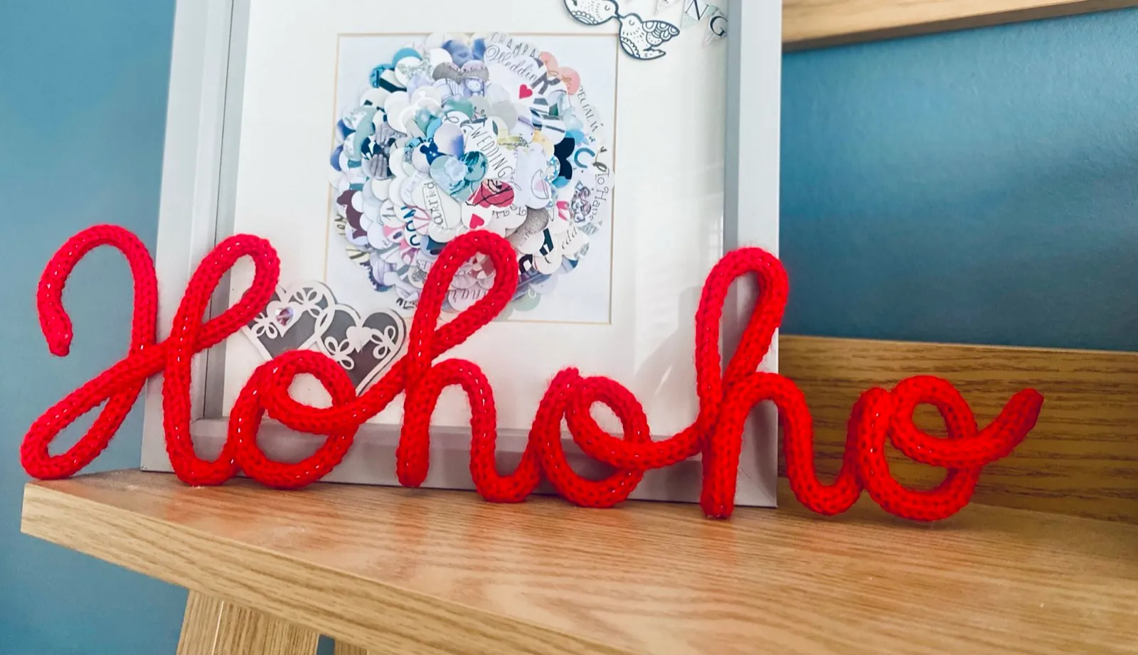 Ho Ho Ho: A cheery Ho Ho Ho in hand-knitted Christmas red.
