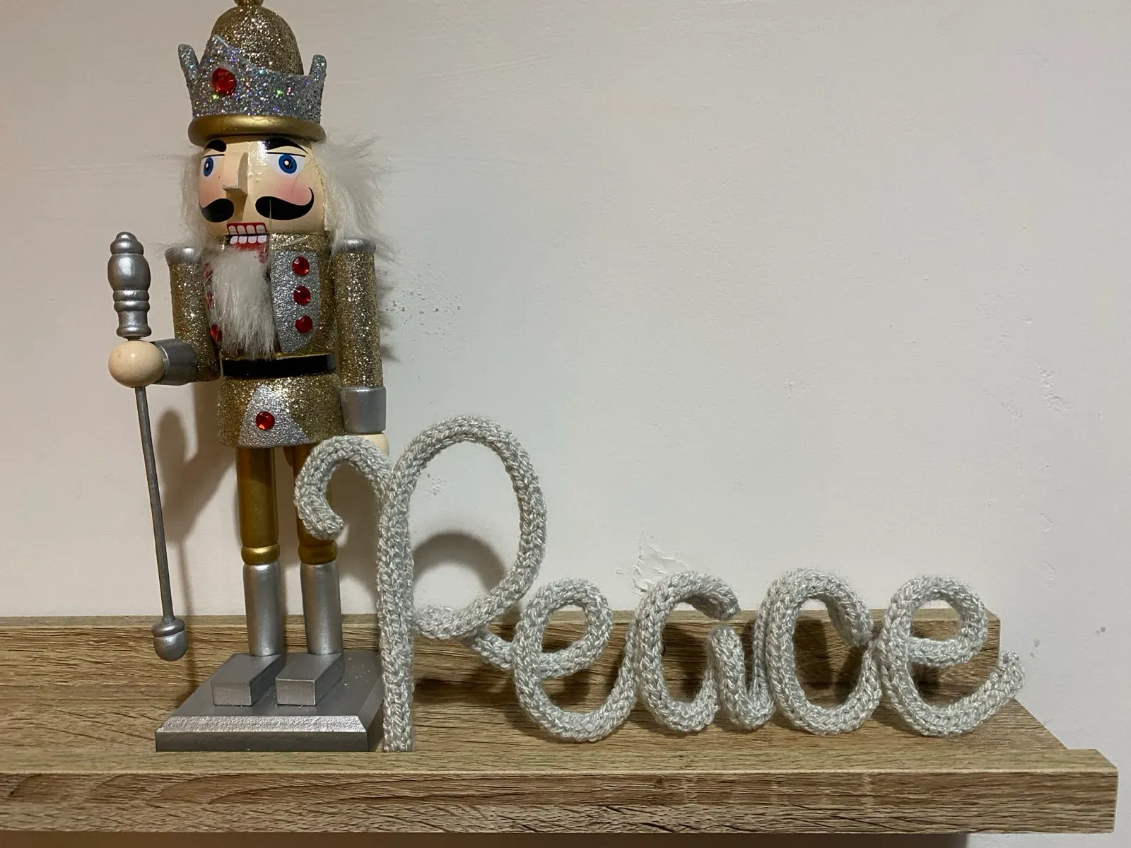 Peace: A calm, sparkly Peace in silver-grey knit.
